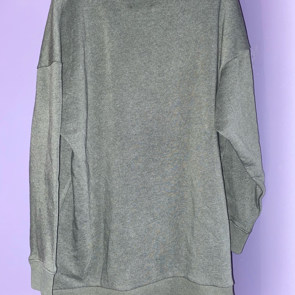 green sweatshirt with low turtle neck